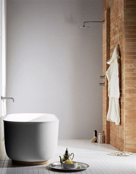 Baignoire îlot Rexa Design modèle Hammam avec socle en argile