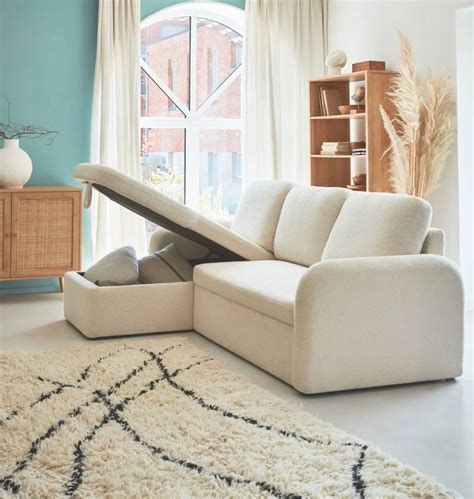 Infographie montrant l'espace de rangement dans un canapé d'angle