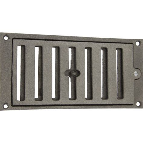 Grille d'aération rectangulaire en bois sur une porte