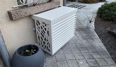 Unité extérieure de climatisation avec un cache clim élégant