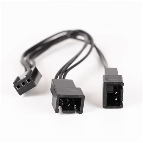 Illustration d'un connecteur de ventilateur à 3 broches et d'un connecteur à 2 broches côte à côte