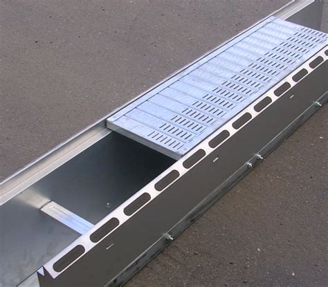 Diagramme illustrant un système de ventilation à caniveaux pour stockage à plat.