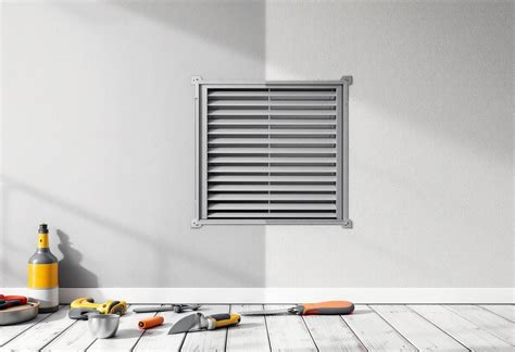 Gros plan sur une grille d'aération encrassée