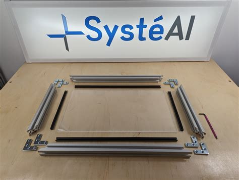 Détail du cadre de montage en profilé aluminium d'une trappe de visite