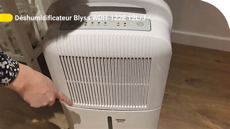 Illustration d'un déshumidificateur Blyss avec des flèches indiquant le réservoir, le filtre et le panneau de contrôle
