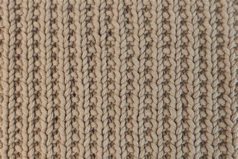 Point de sable montrant ses deux faces