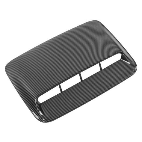 Gros plan sur une aération de capot en fibre de carbone