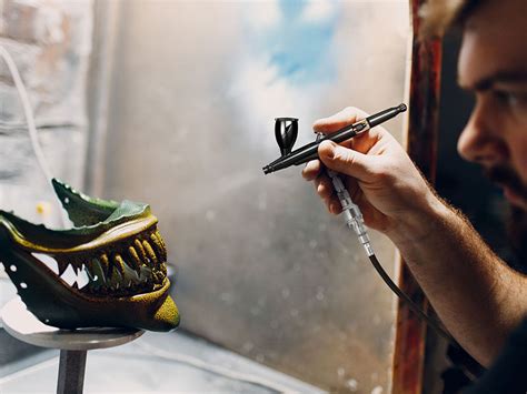 Airbrush painting a model