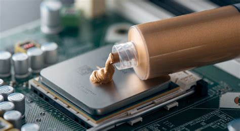 Application de pâte thermique sur un processeur de console