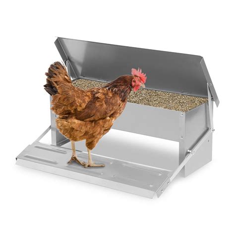Mangeoire à pédale pour poules