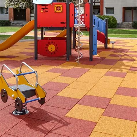 Dalles de caoutchouc colorées pour aire de jeux
